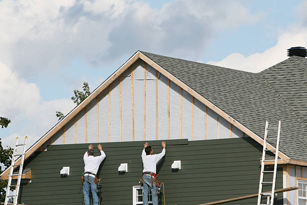 Professional Siding technician working in Statesville, NC